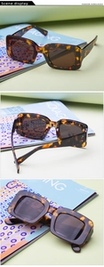 Detailed views of tortoise shell rectangle sunglasses featuring dark lenses and metal rivets