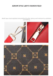 Detailed view of red leather straps and gold-plated hardware on the patterned tote