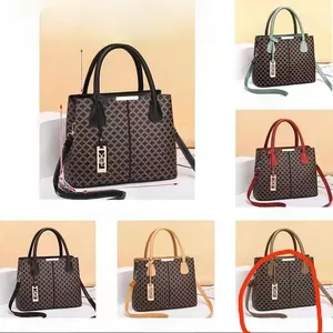 Multiple color options of large geometric print tote bags with removable shoulder straps