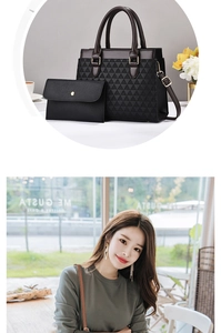 Macro detail of black geometric embossed leather tote with golden hardware and pouch