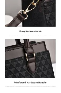 Detail of glossy gold metal buckle and reinforced handle hardware on textured tote bag