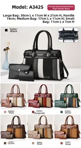Detailed view of the 3-piece composite handbag set with color-blocking striped pattern