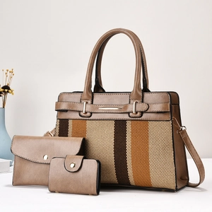 Detailed set of three brown faux leather bags featuring ethnic woven texture and gold hardware