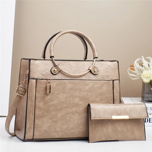 Elegant beige PU leather handbag set with matching wallet and golden hardware details