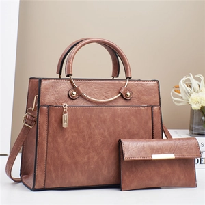Brown faux leather handbag set with adjustable strap and vintage gold ring hardware