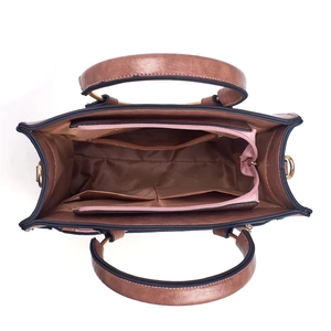 Brown leather crossbody bag with spacious interior and multiple organizational pockets