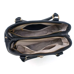 Detailed interior of navy lychee leather tote showing multiple compartments and gold hardware