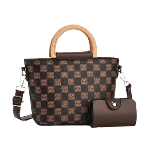 Checkered tote bag set with wooden handles and matching small pouch on white background