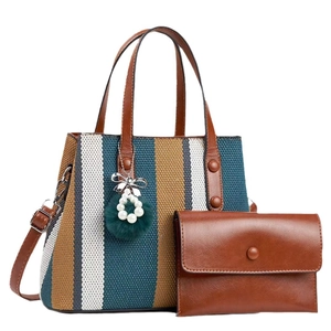 Fashionable large striped canvas tote bag set with matching brown leather pouch and charm