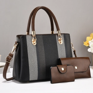 Three-piece women bag set featuring striped tote and brown leather clutches