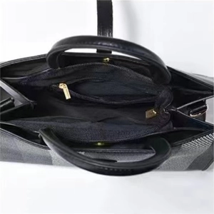 Top view of interior layout with central zip pocket and plaid check pattern details