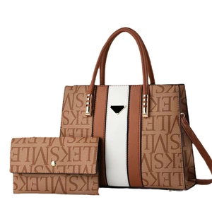 Two-piece tote set with smile pattern in brown and white contrast leather