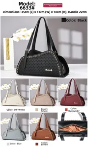 Detail of woven texture handbag with metal chain and color options 35x11x18cm