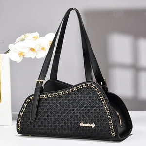 Elegant black woven shoulder bag with gold chain trim and dual leather handles