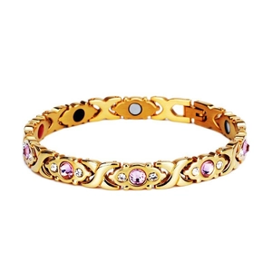 Vista macro del bracciale magnetico in oro con cristalli rosa e magneti terapeutici