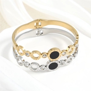 Elegant Roman numeral bangle set in gold and silver finish with sparkling zircon stones