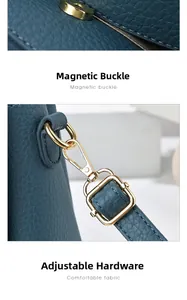 Close-up of golden magnetic buckle and metal swivel snap hook on blue textured leather bag