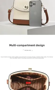 Detailed view of the contrast color bucket bag with multi-layer interior and phone size comparison