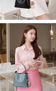 Fashionable textured bucket bag with cute bear charm and woven rope handle details