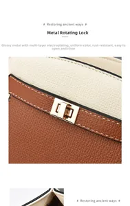 Détail d'un sac à main en cuir grainé avec fermoir rotatif en métal doré de qualité