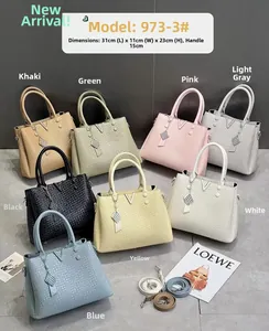 Detailed size chart for the large leather tote bag with V-logo and woven texture