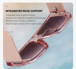 Detail of pink transparent sunglasses showing the integrated nose pad and sturdy hinges