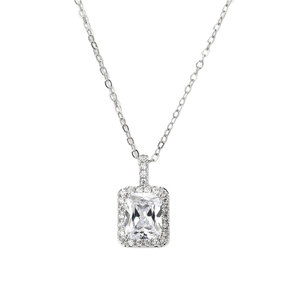 Elegant emerald cut cubic zirconia pendant necklace with halo setting on white background