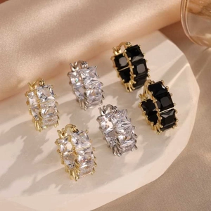 Set of six shimmering pave zircon hoop earrings in gold and silver with square cut stones