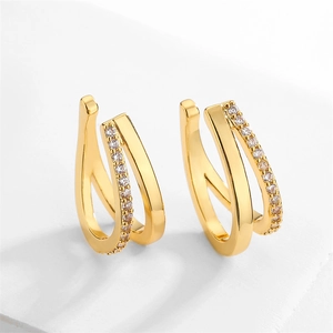 Macro shot of gold-plated double layer ear cuff with micro-pave cubic zirconia crystals