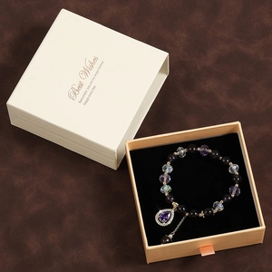 Purple crystal star bracelet with teardrop pendant in a branded Best Wishes gift box