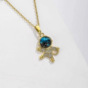 Detailed view of starry sky astronaut pendant necklace with pavé zircon stones