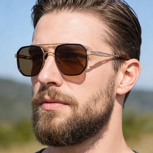 Detail of vintage square sunglasses with double bridge and hollow metal spring hinges