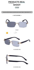 Detail einer randlosen rechteckigen Sonnenbrille mit schwarzen Holzmaserung-Bügeln und Panther