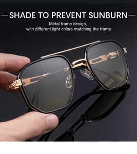 Detail of square double-bridge sunglasses with black gold frame and metallic engraving