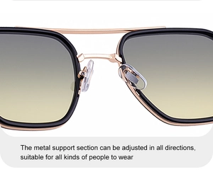 Detail of adjustable metal nose pads and golden bridge on square frame sunglasses