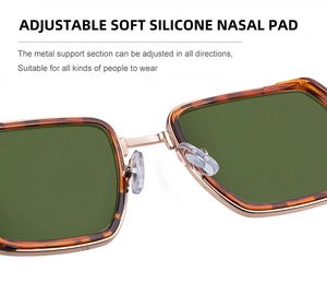 Close-up of adjustable soft silicone nose pads on square metal frame sunglasses