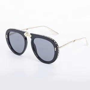 Fashionable oversized rhinestones sunglasses model 8870 in black with gold metal temples