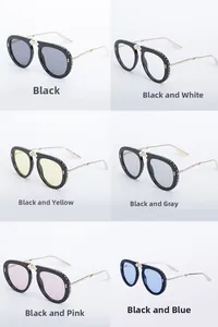 Detail view of rhinestone aviator sunglasses in six colors with gold metal temples