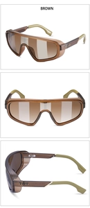 Macro details of oversized brown steampunk sunglasses with olive green temple tips