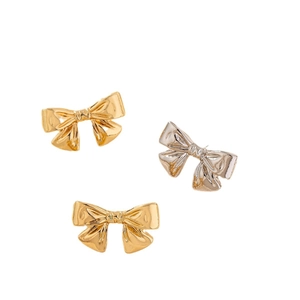 Boucles d'oreilles nœuds papillon en métal poli doré et argenté pour femme
