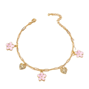 Elegant gold anklet with pink flower pendants and textured heart charms for women