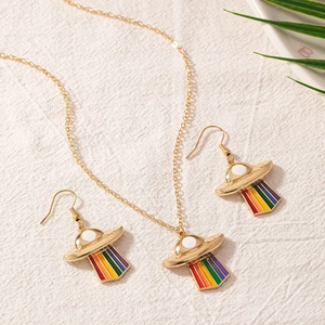 Golden UFO jewelry set with vibrant rainbow enamel necklace and hook earrings