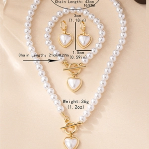 Parure de bijoux en perles dorées avec collier pendentif cœur, bracelet et boucles