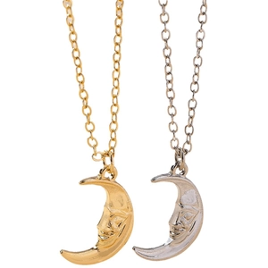 Elegant gold and silver crescent moon face pendant necklaces with relief texture detail