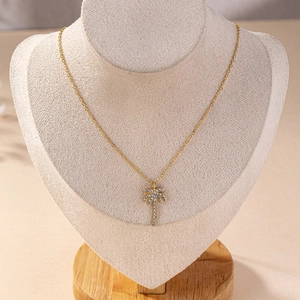 Elegant gold palm tree necklace with crystals for tropical summer vacation style