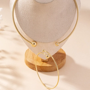 Ensemble bijoux collier torque doré à billes et bracelet jonc ouvert pour femme