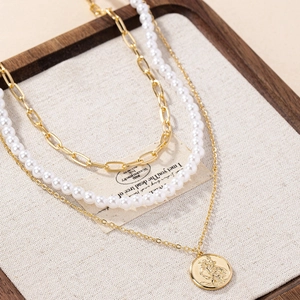 Three-layer vintage gold chain necklace set with white pearls and coin pendant