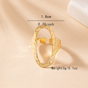 Minimalist gold oval hollow ring with hammered texture finish and adjustable open band