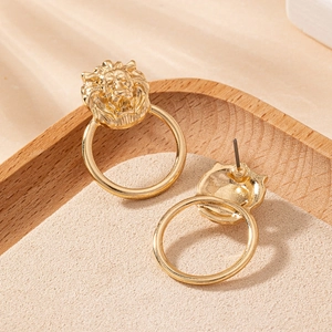 Fashionable golden lion head door knocker earrings featuring a round hoop pendant style
