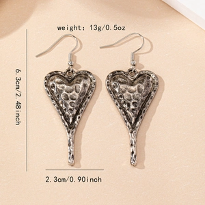 Vintage silver heart drop earrings with hammered texture and 6.3cm hanging length